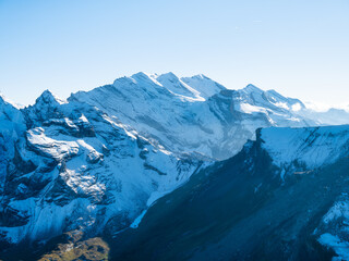 Poster - Mountain scenery in the Swiss Alps. Mountains peaks. Natural landscape. Mountain range and clear blue sky. Landscape in the summertime.