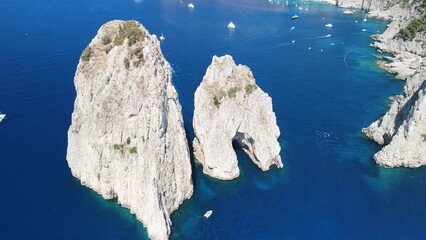 Sticker - Amazing aerial view of Faraglioni in summer season. Rock natural formations in Capri Island, Italy