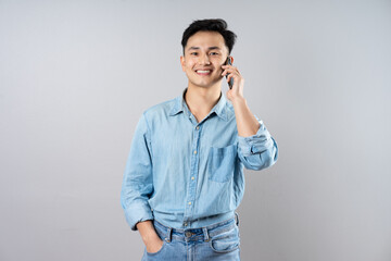 Wall Mural - image of young businessman male on gray background