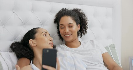 Sticker - Phone, bed and happy couple of friends relax with social media post, funny meme or reading internet blog at home. Young gen z woman or lesbian people talking of lgbtq love, care and chat in bedroom