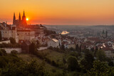 Fototapeta Miasto - Early morning view of St. Vitus cathedral and the Lesser Side in Prague, Czech Republic