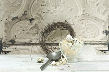 Quail Eggs In A Glassbowl, Spoon And Easter Wreath
