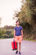 © Sangiao_Photography - indian south asian middle aged man walk with suitcase on the road. insurance and divorce concept