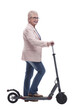 © ASDF - side view. modern elderly woman with electric scooter