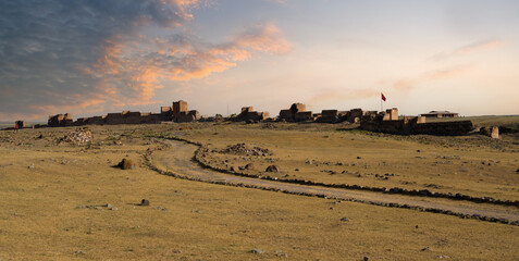 Wall Mural - Ani ancient city. View of the historical Ani castle walls at sunrise. It is on the UNESCO world heritage list. Turkey's major touristic travel destinations. summer morning. Ani , Kars, Turkey