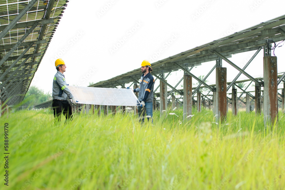 Engineering and technician unloading repaired solar panels to be ...