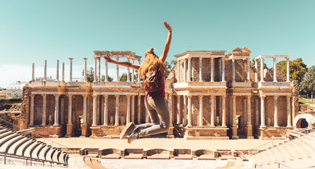 Wall Mural - Happy woman tourist in Merida theater in Merida- Extremadura in Spain