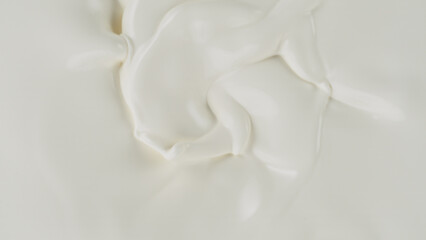 Wall Mural - Freeze motion of whirling milk cream, close-up