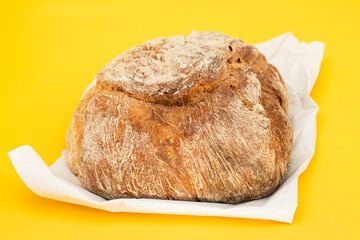 Poster - Fresh bread with cereals on yellow background