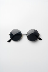 Canvas Print - Sunglasses on a white background top view