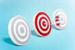 © ADDICTIVE STOCK - Round shaped target with arrows on blue background