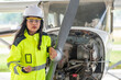 © reewungjunerr - Technician fixing the engine of the airplane,Female aerospace engineering checking aircraft engines,Asian mechanic maintenance inspects plane engine