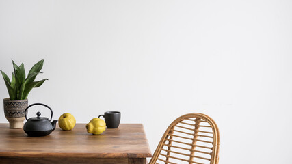 Wall Mural - dining table with teapot, cup and fruit in kitchen