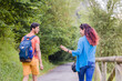 © Sangiao_Photography - mixed race couple trekking in senda del oso, Asturias. Mid adult ecotourism in Proaza