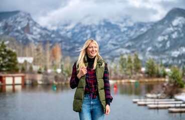 Woman hiking in the Rockies, winter 