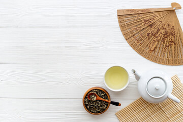 Wall Mural - Japanese table setting with teapot and cups of tea