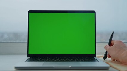 Aufkleber - laptop with green screen businessman holding pen workplace at home or office