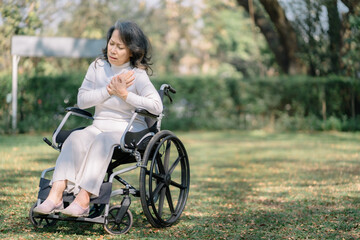 Wall Mural - elderly woman suffers chest pain, concept health in old age and heart problems.