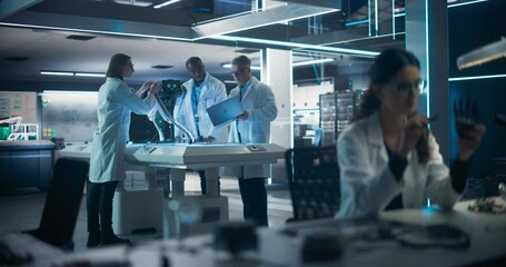 Poster - Research and Development Facility with Engineers Working on a High Mobility Robot Dog Project. Focus Switches to a Female Scientist Developing a Prosthetic Robotic Hand at Her Desk