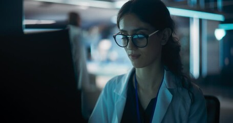 Poster - Portrait of a Professional Female Specialist Using Computer at Work in Research and Development Agency. Young Multiethnic Engineer, Developer or Scientist Working in Development Technology Office