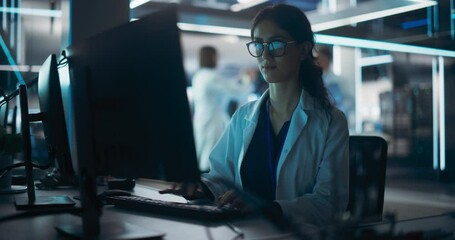 Poster - Portrait of a Young Robotics Engineer Using Desktop Computer, Analyzing Robotic Machine Concept in a High Tech Factory. Female Scientist Researching Innovative Ways to Benefit and Progress Humanity