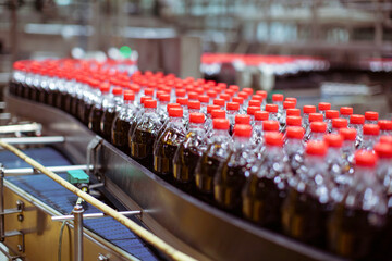 Wall Mural - Beverage factory interior. Conveyor flowing with bottles for carbonated water.