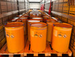 © yarm_sasha - Loading, transportation and unloading of barrels with hazard class 9 in a semi-trailer. Transportation of dangerous goods by ADR cargo transport