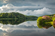 © robertharding - Reflections on a calm summer evening at Kennick Reservoir, Dartmoor National Park, Devon