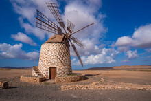 View Of Traditional Windmill And Landscape On A Sunny Day, La Oliva, Fuerteventura