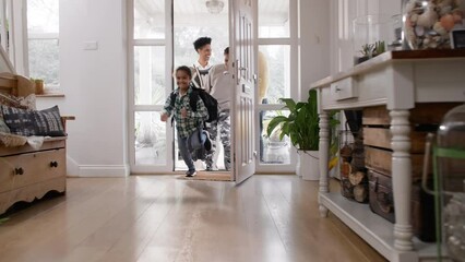 Wall Mural - Family with boy with Down syndrome arriving at holiday let