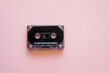 © Austockphoto - cassette music tape on pink background