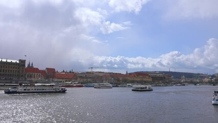 Wall Mural - Old town of Prague. Czech Republic over river Vltava with Saint Vitus cathedral on skyline. Bright sunny day blue sky. Praha panorama landscape view.
