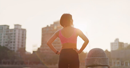 Poster - asian woman jogging in city