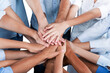 © BillionPhotos.com - Top View of People in Circle with Their Hands Together