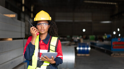 Wall Mural - Industrial Engineers or Foreman inspecting and check up machine at factory machines.Technician working in metal sheet at industry..