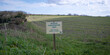 © Rob Wilkinson - Wildlife conservation area sign by a field in the Sussex countryside