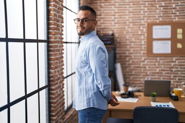 Sticker - Young hispanic man business worker smiling confident standing at office