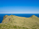 Fototapeta  - Hikking path by the cliffs edge leading to Kallur lighthouse, in north Kalsoy