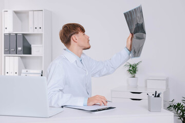 Sticker - Doctor examining neck MRI image in clinic