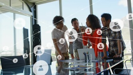 Poster - Animation of network of profile icons over diverse colleagues discussing together at office