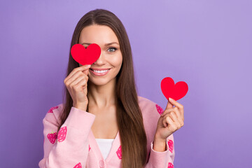 Wall Mural - Photo of sweet shiny lady dressed strawberry print cardigan holding red heart cover eye empty space isolated purple color background
