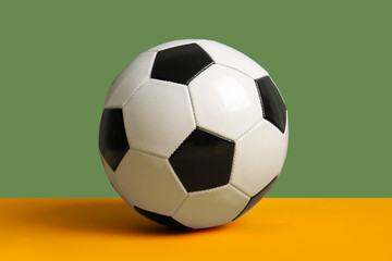 Soccer ball on color  background