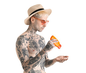 Wall Mural - tattooed man with sunscreen cream on white background