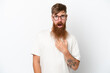 © luismolinero - Redhead man with long beard isolated on white background pointing to oneself