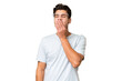 © luismolinero - Young caucasian handsome man over isolated background yawning and covering wide open mouth with hand