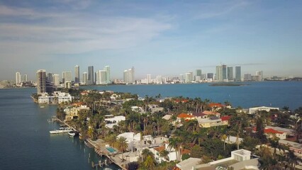 Canvas Print - Aerial view of San Marco Island with residential mansions under a blue sky in Miami, Florida, USA