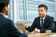 © imtmphoto - asian corporate executives discussing business in office
