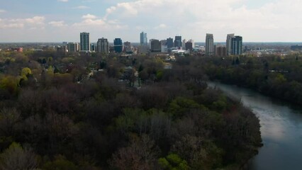 Canvas Print - Aerial view of river surrounded by trees in city Ontario