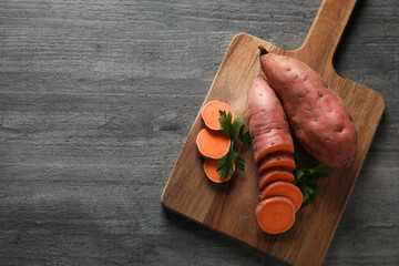 Wall Mural - Concept of vegetables, sweet potato, space for text