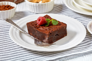 Wall Mural - chocolate brownies with fresh raspberry and mint